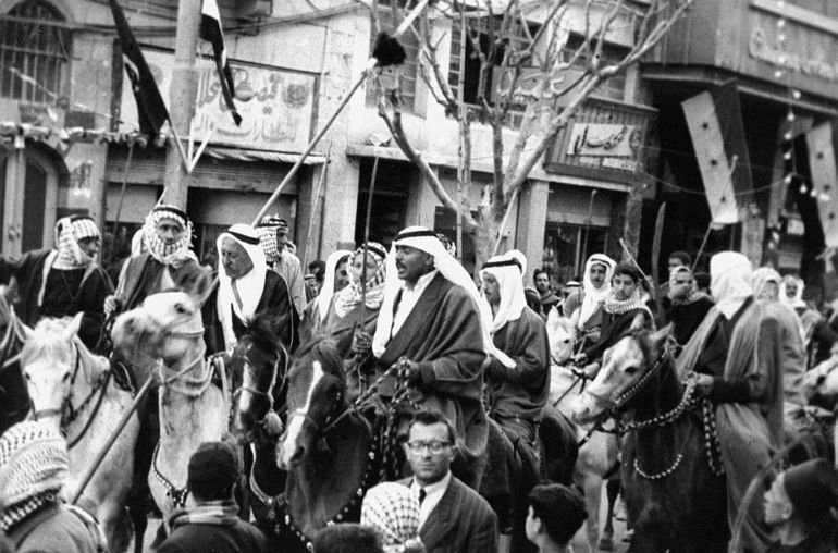 Syrian notables parade on their horses in Damascus 17 April1950 as they celebrate Syria's independence day. Syria gained its independence from France 17 April 1946. (Photo by AFP)