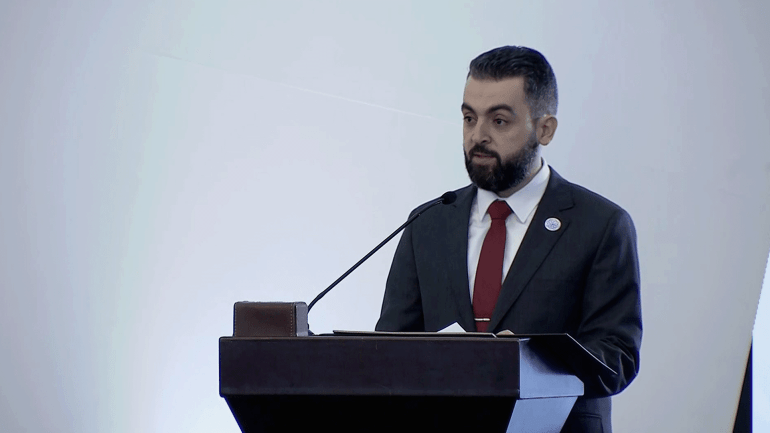 محمد عنجراني وزير الإدارة المحلية السوري المصدر: شاشة الجزيرة في قصر الشعب - دمشق