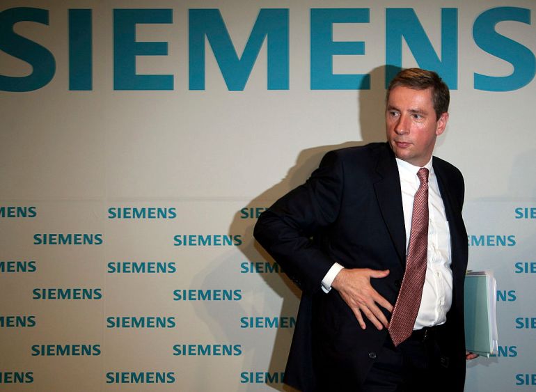 MUNICH, GERMANY - APRIL 26: Siemens CEO Klaus Kleinfeld leaves the press conference at Dorint Hotel after the semi-annual press conference on April 26, 2007 in Munich, Germany. Klaus Kleinfeld announced yesterday that he is stepping down in the wake of a bribery scandal. The resignation comes less than a week after that of Chairman Heinrich von Pierer. (Photo by Johannes Simon/Getty Images)